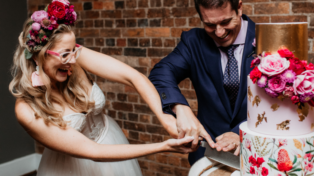 Wedding couple cake cutting at The Transcontinental Hotel